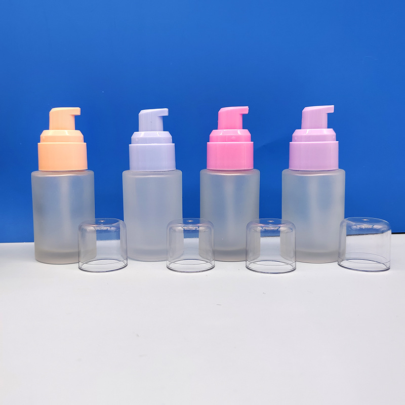 30ml 50ml Round Cylinder Glass Lotion Bottle Liquid Foundation Bottle with Pump and Cover