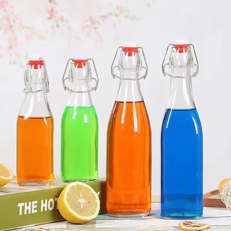 250ml 500ml 1000ml Wholesale Round Clear Kombucha Cold Brew Beverage Drink Bottle Swing Top Glass Juice Bottle