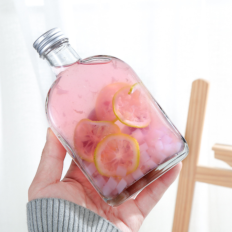 Hot Sale Reusable Glass Water Bottles with Stainless Steel Lids to Store Home Brews, Oils, Vinaigrettes, Wines, Beer, Teas