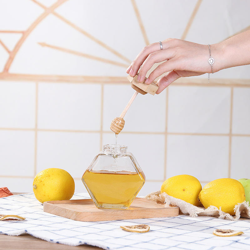 Professionally Sold 250g, 500g, 1000g Empty Honey Bottles, Transparent Honey Combs, Glass Honey Jars with Wooden Lids, Spoons, and Spatulas.