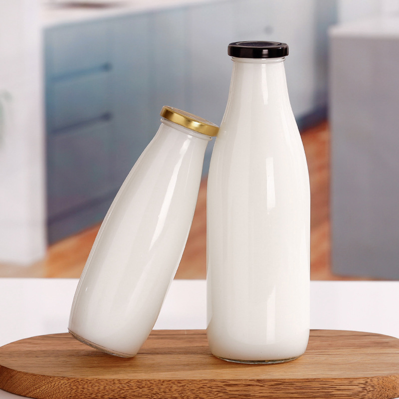 Wholesale 200ml 250ml 500ml 1L Round Glass Milk Bottle Coffee Beverage Drink Empty Juice Bottles with Metal Lid