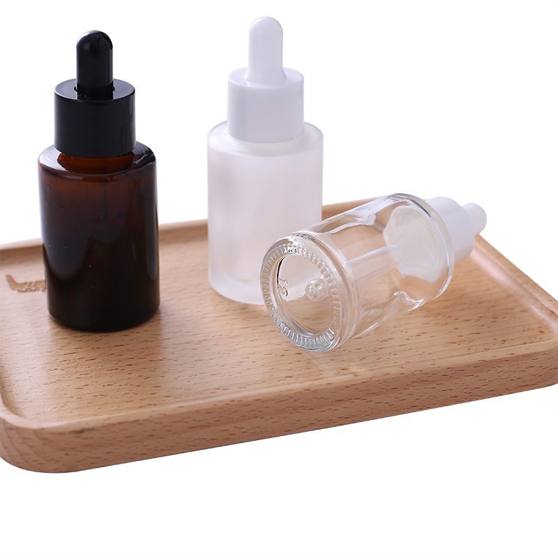 Wholesale Flat Shoulder 30ml 50ml 60ml 100ml Amber Frosted Transparent Black Essential Oil Glass Dropper Bottle