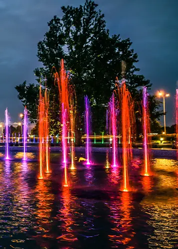 Musical fountain with synchronized water jets and lighting