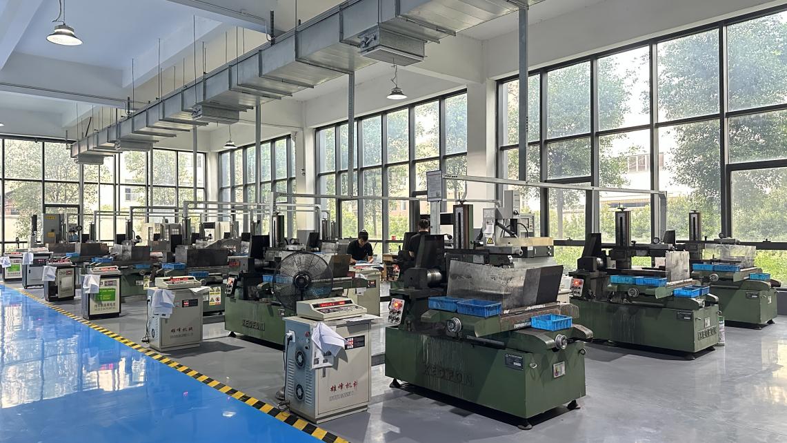 Wire-cutting EDM machine for precision cutting of medical implant components