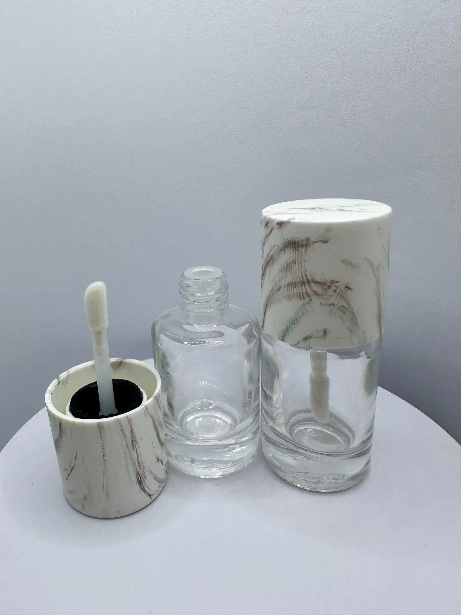 Fashion OEM ODM Packaging Lip Gloss Tube Round Wholesale Plastic Cap Lip Gloss Bottle