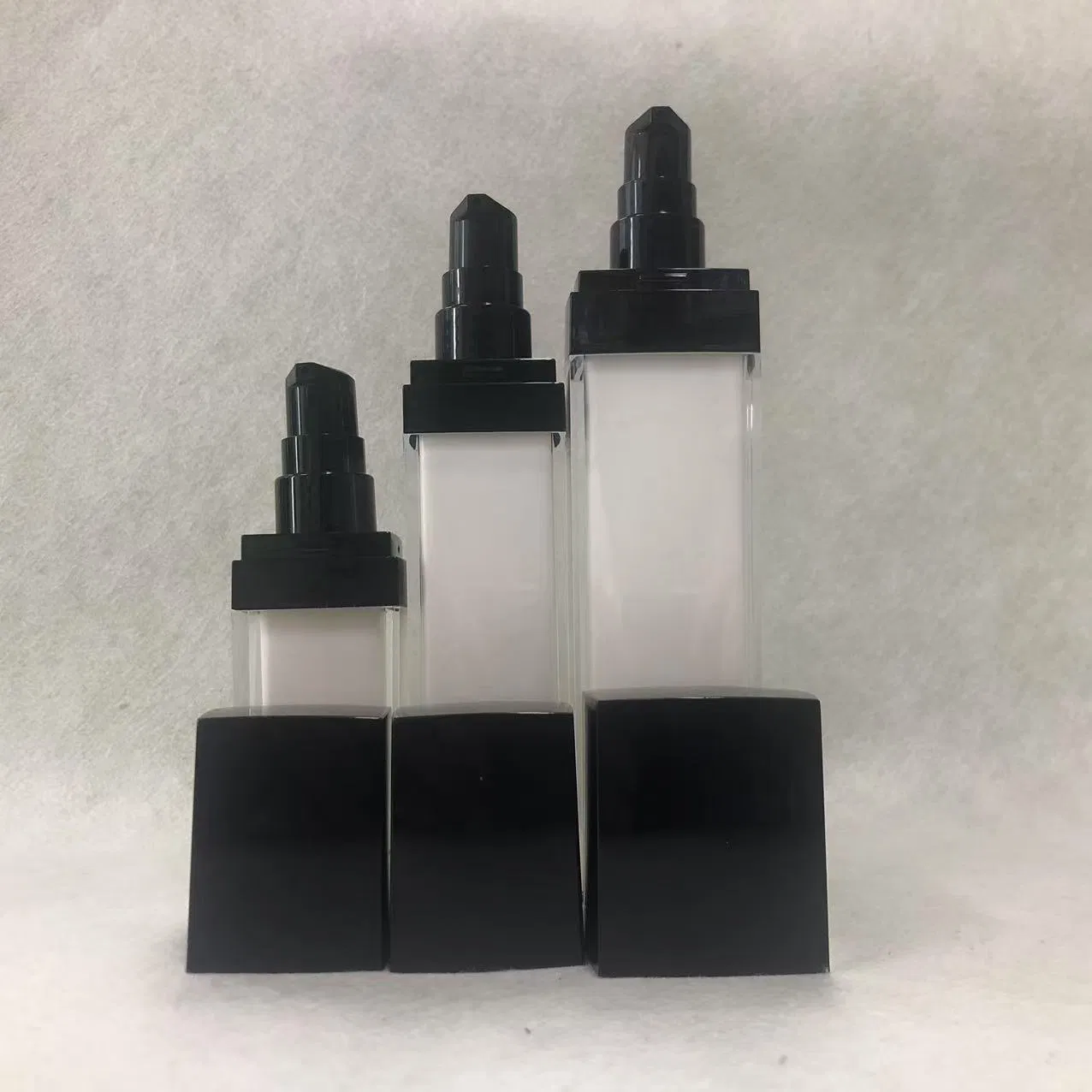 Black and White Square - Shaped Plastic Cosmetic Lotion Bottle with Black Pump Multiple Sizes Empty Refillable Customizable for Skincare and Makeup