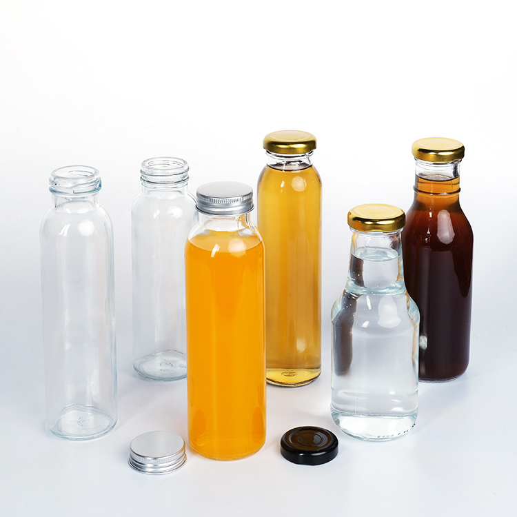 Wholesale Clear Glass Beverage Bottles with Lids for Juice Packaging
