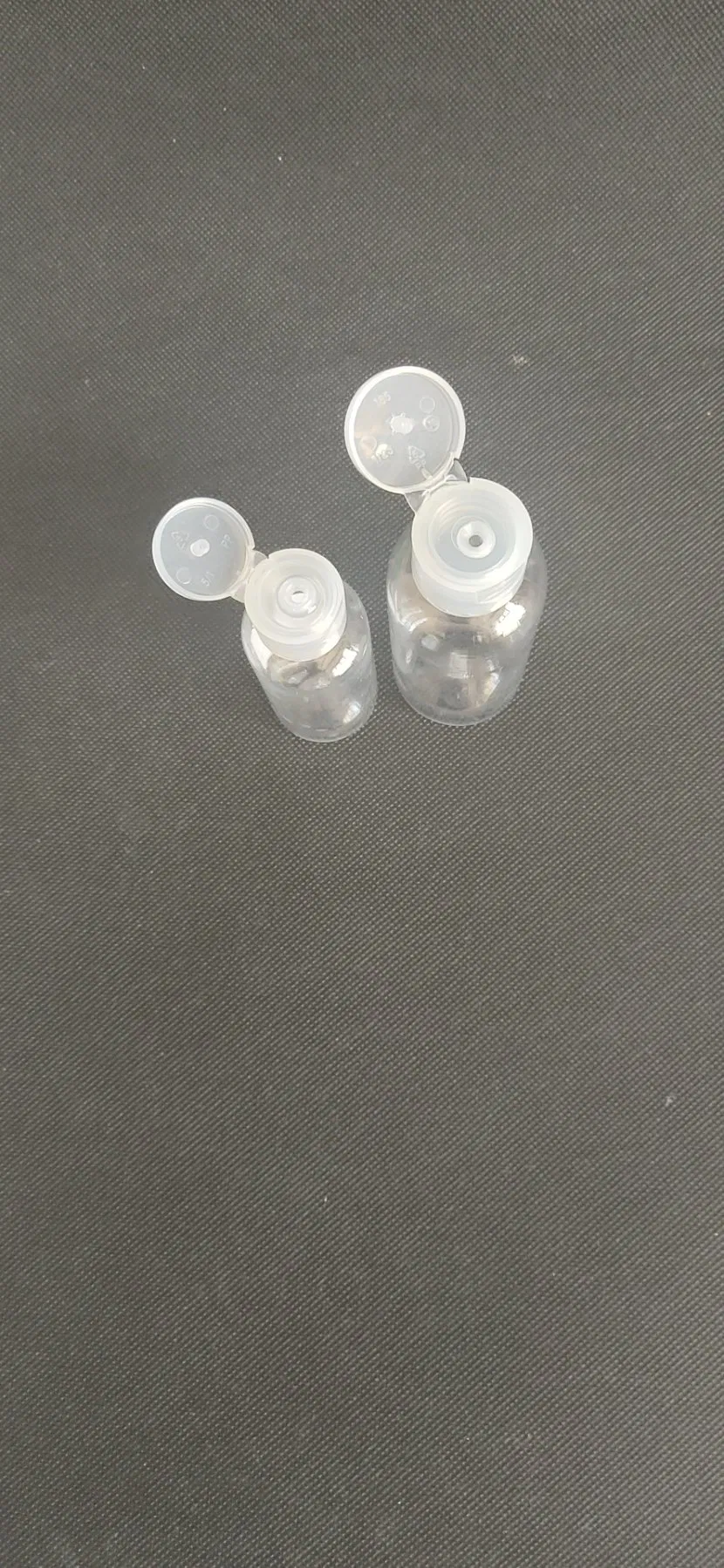 50ml Oval Transparent Pet Plastic Hand Sanitizer Bottle with Flip-Top Cap