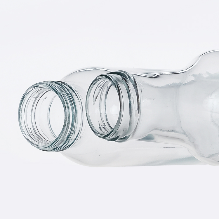 Wholesale Clear Glass Beverage Bottles with Lids for Juice Packaging