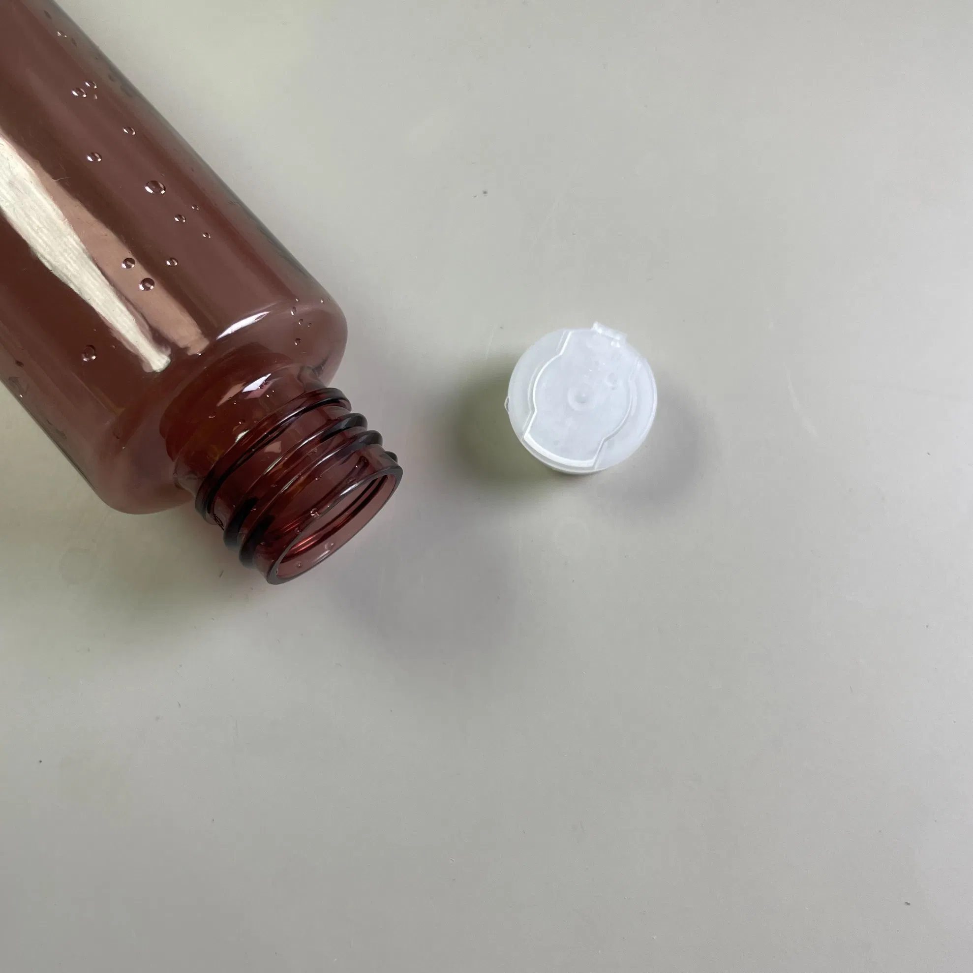 100ml Pet Plastic Bottle with Inner Stopper Caps, Flat-Shoulder Flip-Top Empty Bottles for Toner, Lotion, Shampoo, and Shower Gel.