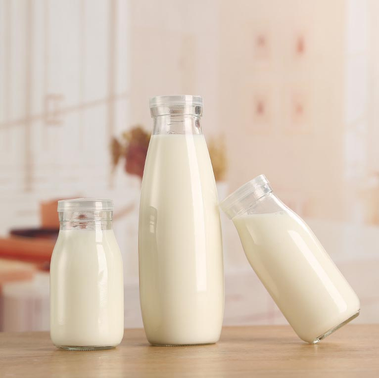 Wholesale 16oz 500ml Empty Fruit Juice Milk Beverage Glass Bottle with Plastic Lid