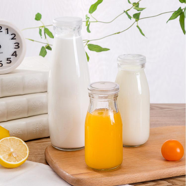 Wholesale 16oz 500ml Empty Fruit Juice Milk Beverage Glass Bottle with Plastic Lid