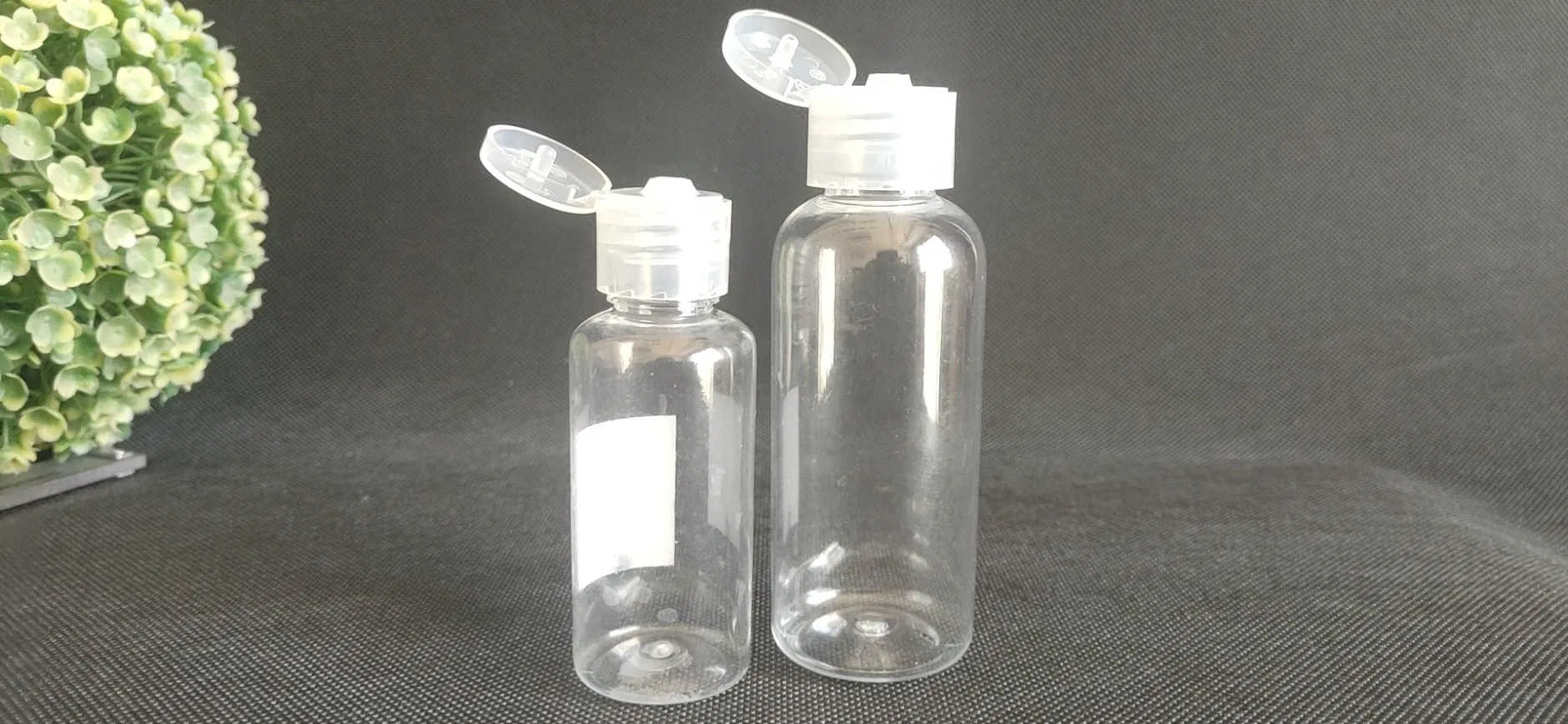 50ml Oval Transparent Pet Plastic Hand Sanitizer Bottle with Flip-Top Cap