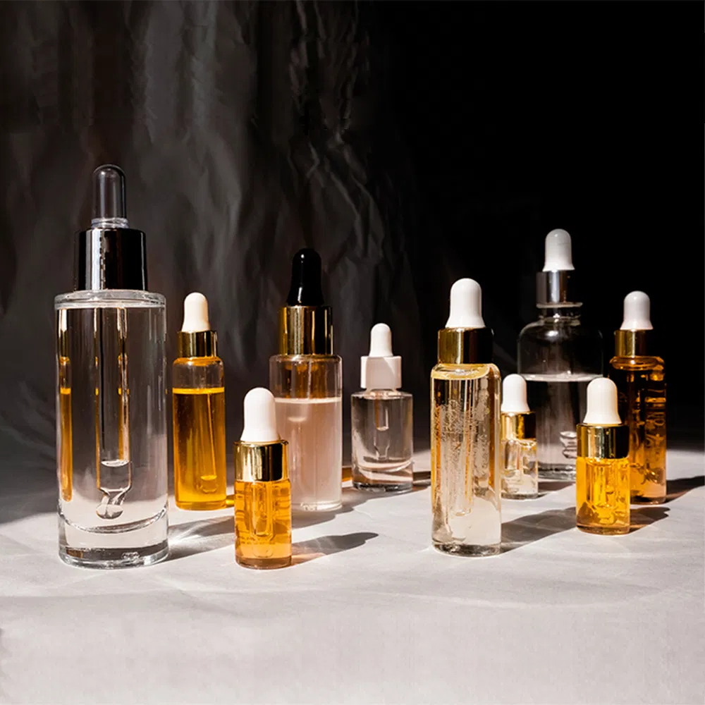 Glass Dropper Bottle with Plastic Collar and Custom Logo for Essential Oils