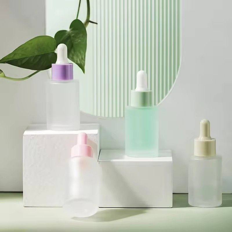 Fashion Hot Selling Macaron Color Transparent Frosted Glass Bottle Plastic Head Dropper Cosmetic Essential Oil Essence Bottle