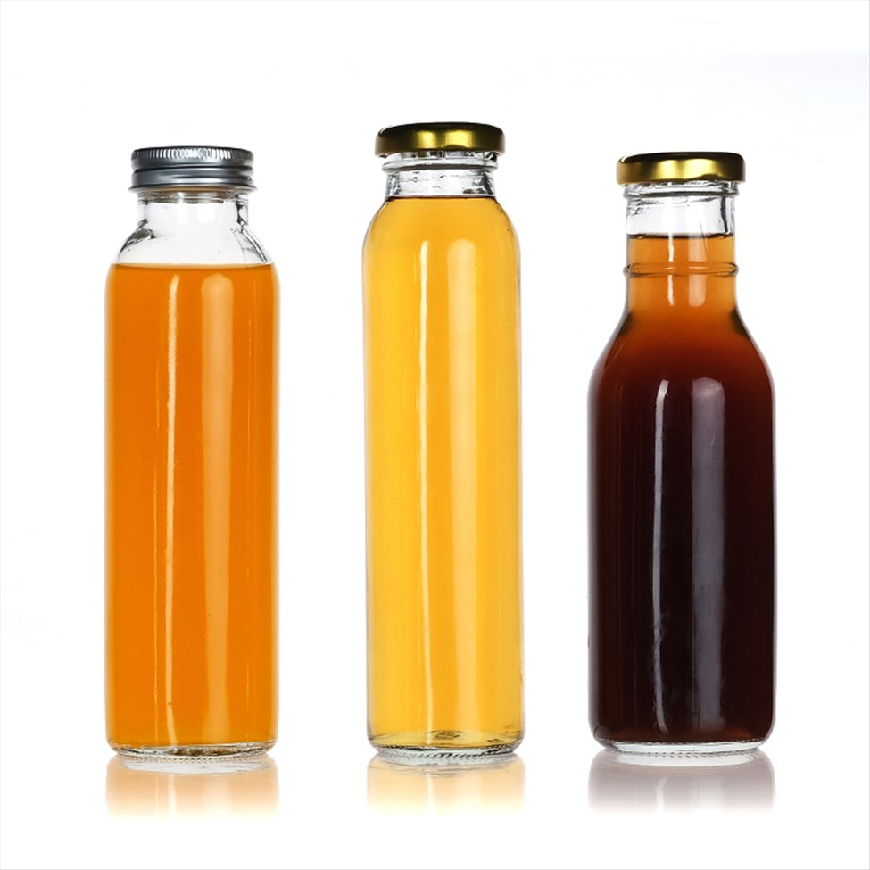 Wholesale Clear Glass Beverage Bottles with Lids for Juice Packaging
