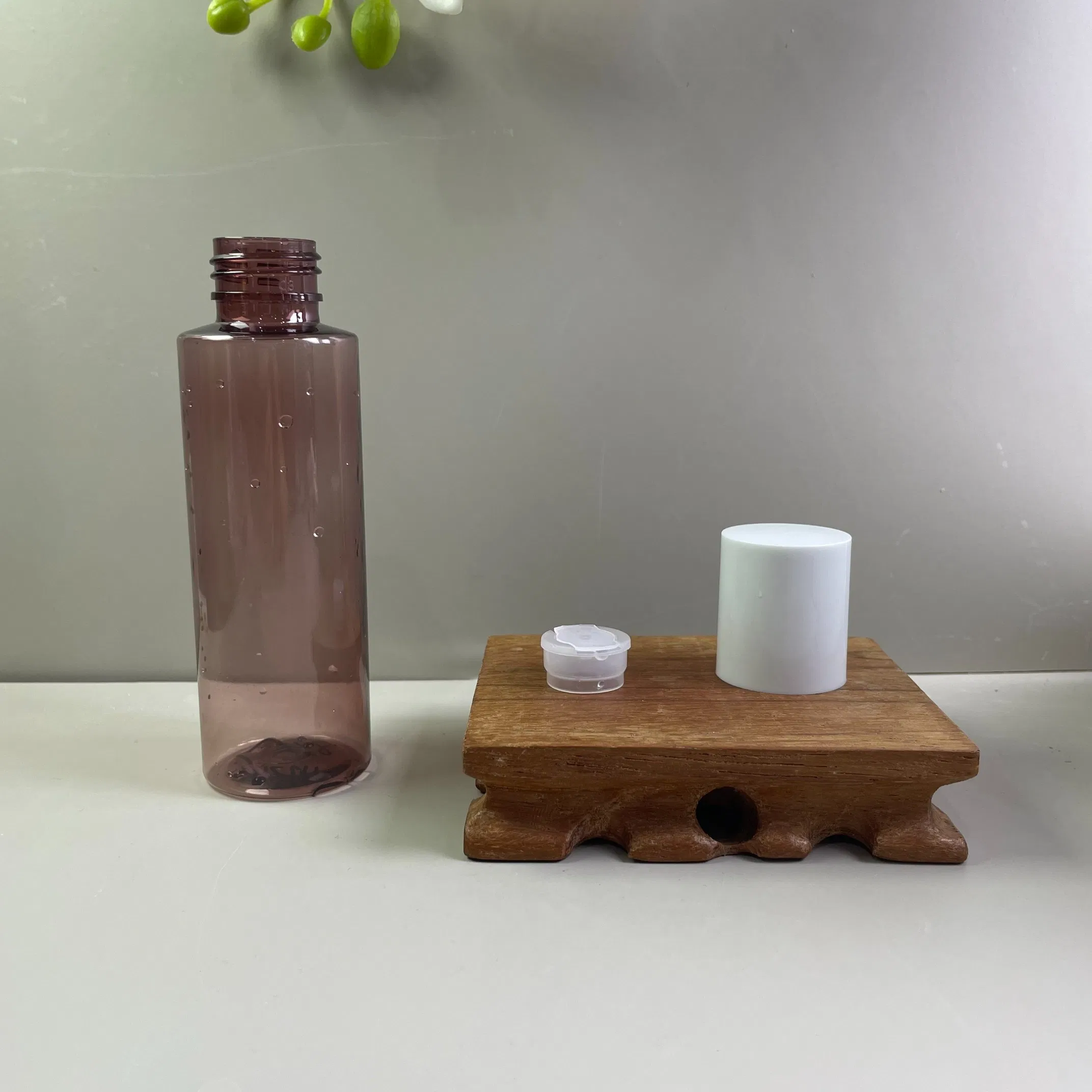 100ml Pet Plastic Bottle with Inner Stopper Caps, Flat-Shoulder Flip-Top Empty Bottles for Toner, Lotion, Shampoo, and Shower Gel.