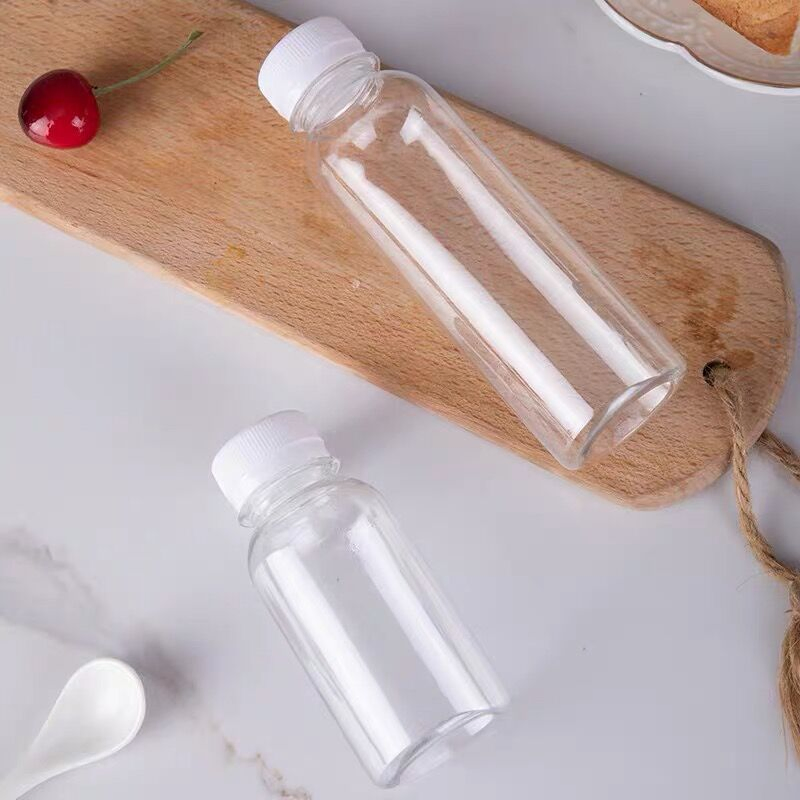 Factory Direct Supply 200~500ml Transparent Round Pet Mineral Water Bottles Disposable Plastic Beverage Juice Drinking Bottle