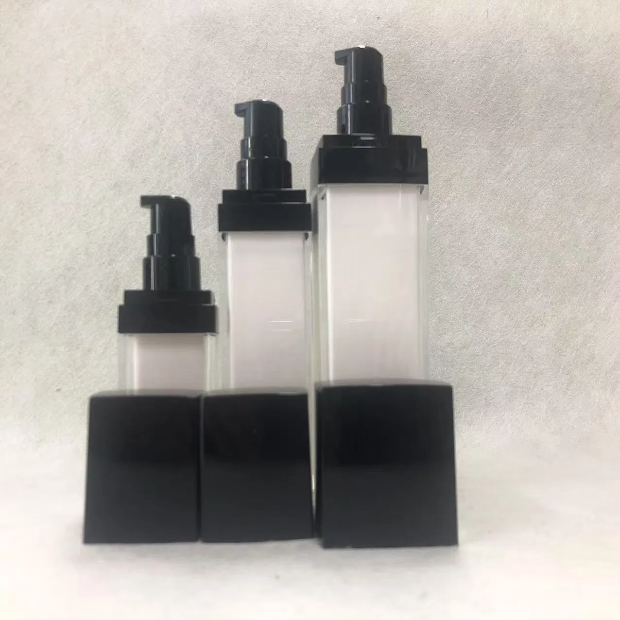 Black and White Square - Shaped Plastic Cosmetic Lotion Bottle with Black Pump Multiple Sizes Empty Refillable Customizable for Skincare and Makeup