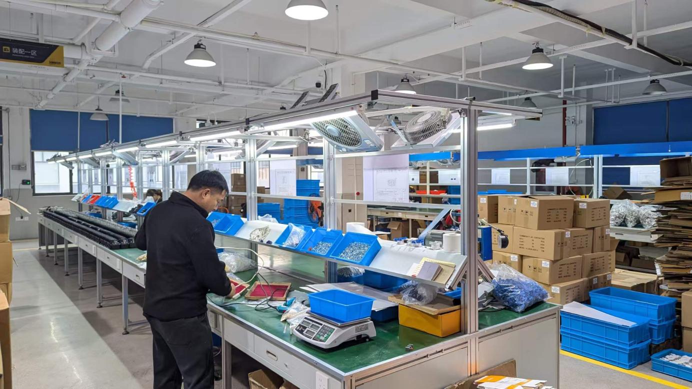 Circuit breaker assembly line at Bowser Electric production facility