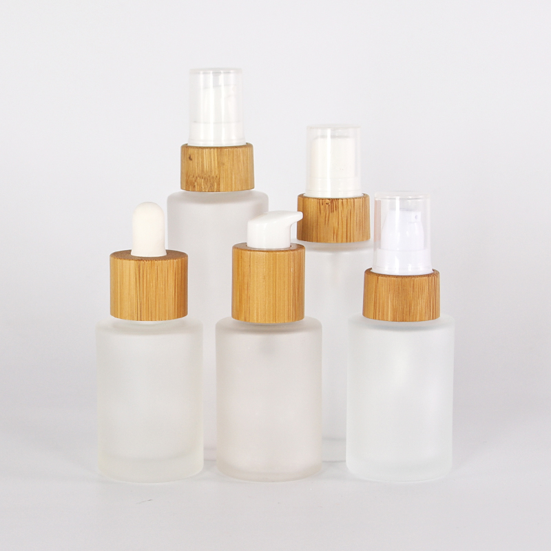 Oem Environmentally Cosmetic Packaging Sets 30ml 50ml 80ml Bamboo Glass Spray Pump Bottle Dropper Oil Lotion Glass Bottles