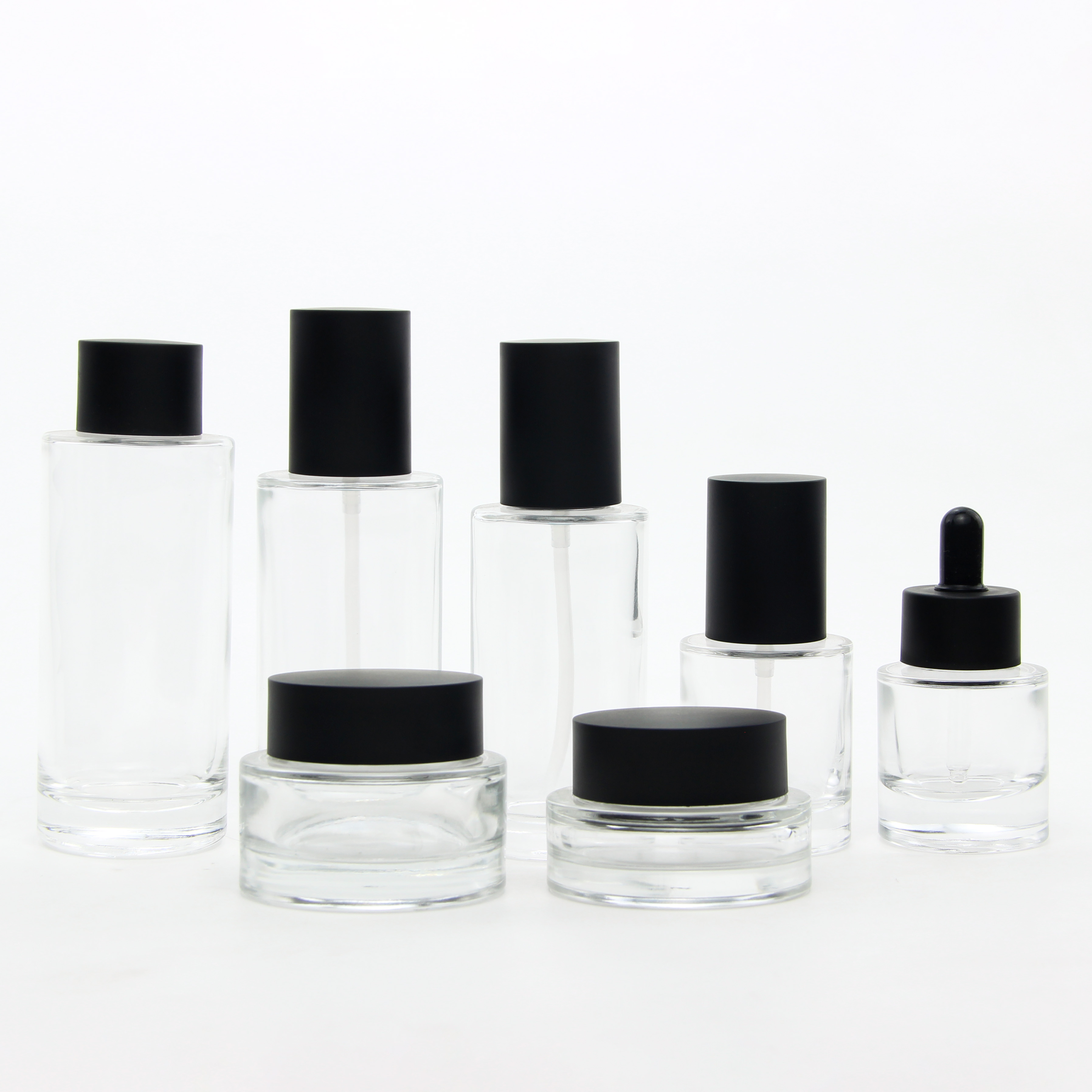 New Design Luxury Thick Bottom clear Cosmetic Serum Lotion Pump Bottle Glass Bottles and Jars Dropper Bottle Skincare Packaging