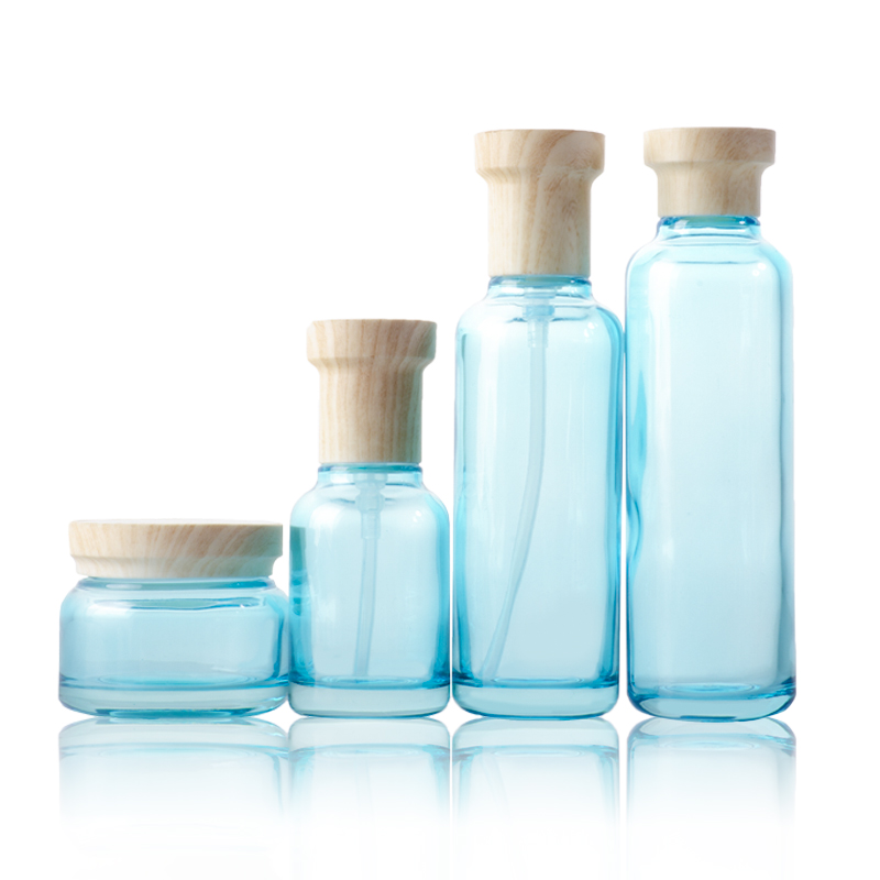 Hot Sale Blue Pink Clear Cosmetic Glass Bottle with Cap and Jar Set for Cosmetics Containers and Packaging