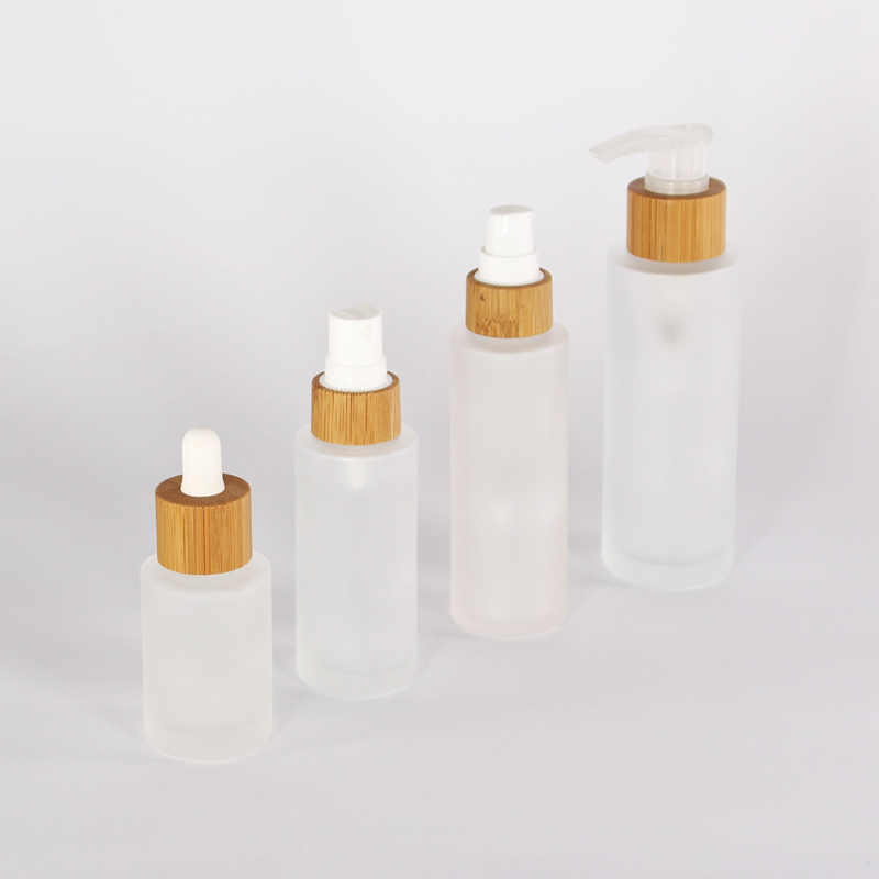 Oem Environmentally Cosmetic Packaging Sets 30ml 50ml 80ml Bamboo Glass Spray Pump Bottle Dropper Oil Lotion Glass Bottles
