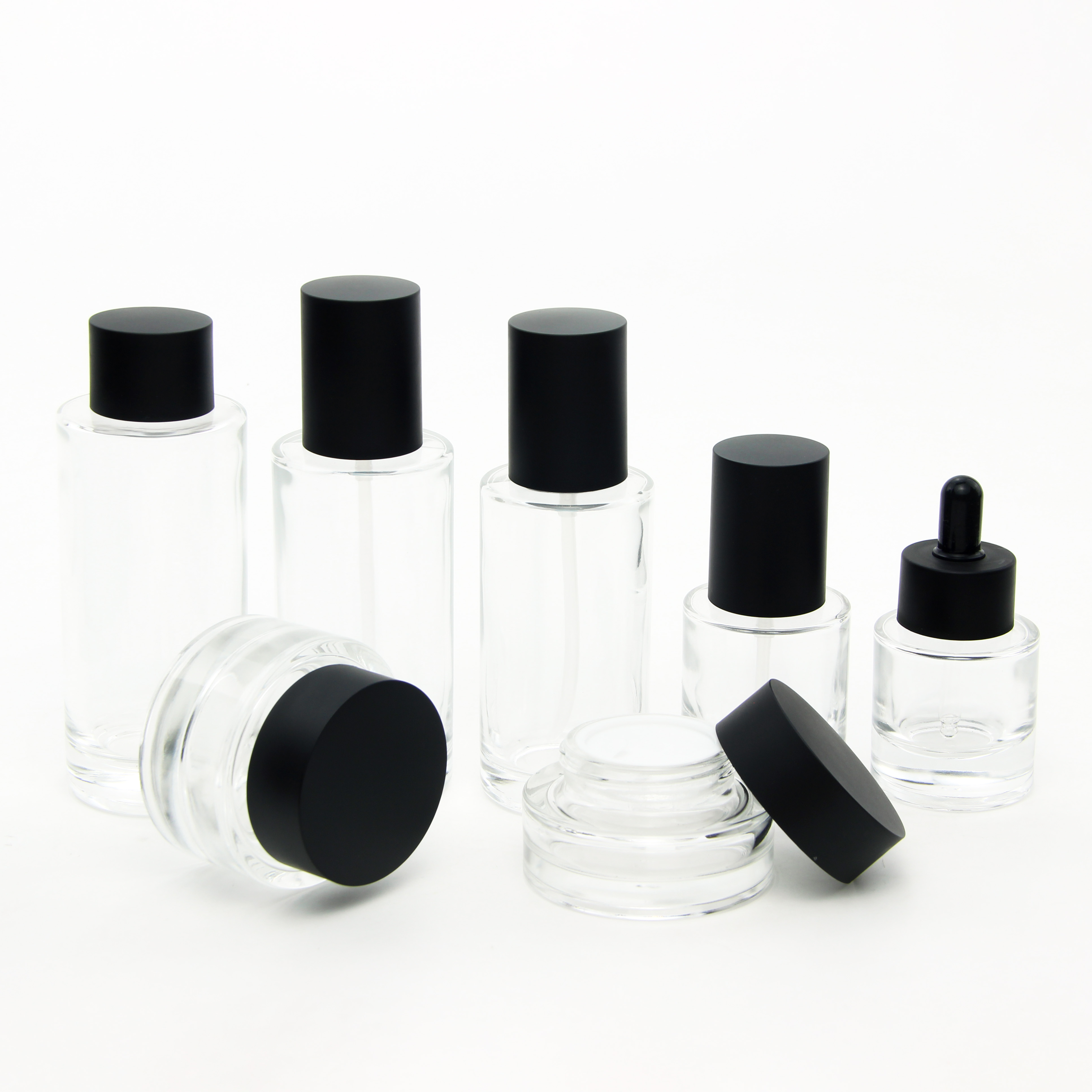 New Design Luxury Thick Bottom clear Cosmetic Serum Lotion Pump Bottle Glass Bottles and Jars Dropper Bottle Skincare Packaging