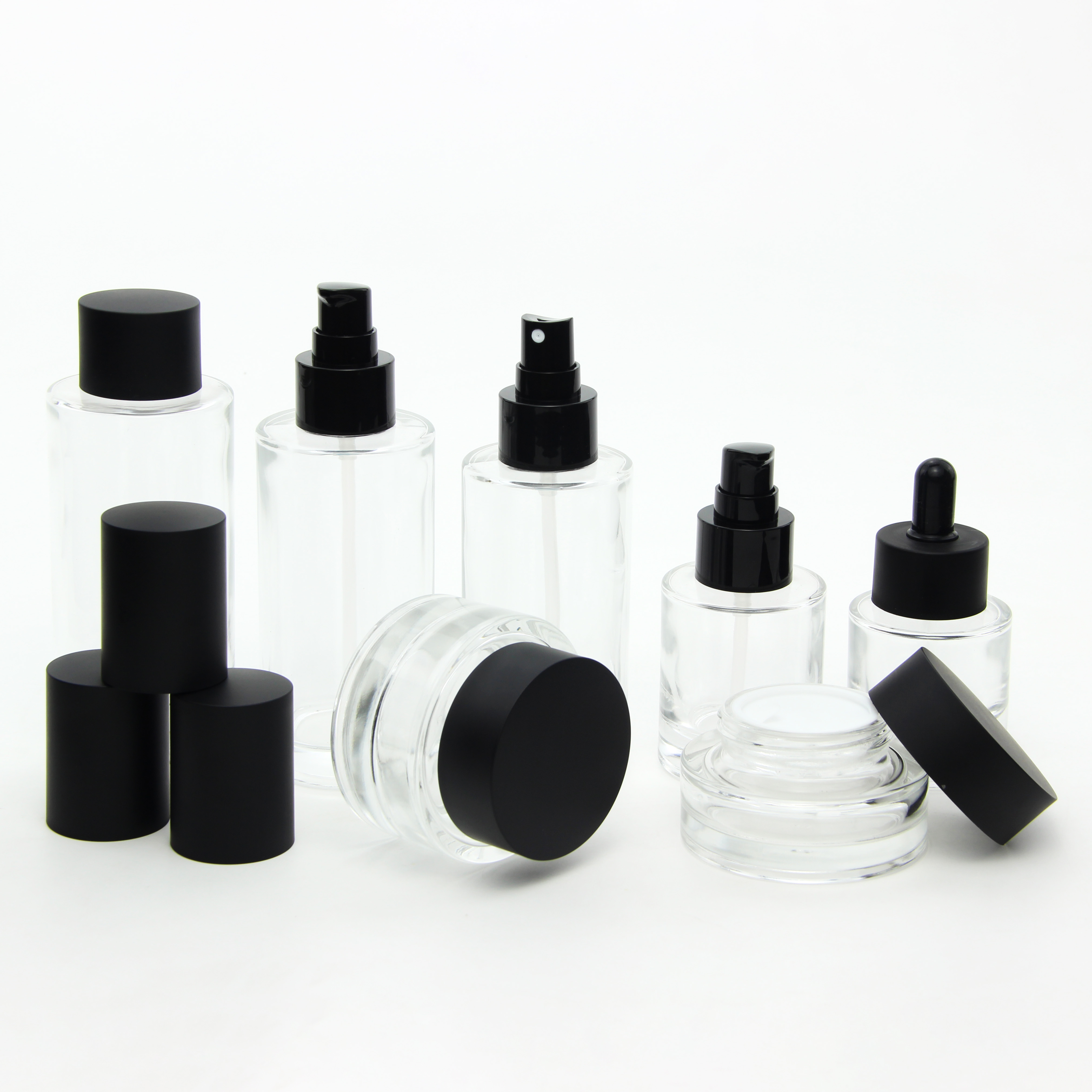 New Design Luxury Thick Bottom clear Cosmetic Serum Lotion Pump Bottle Glass Bottles and Jars Dropper Bottle Skincare Packaging