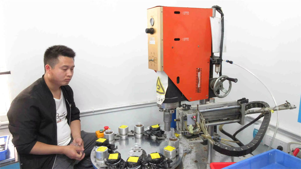 Ultrasonic welding machine used in BryMax Beauty production line