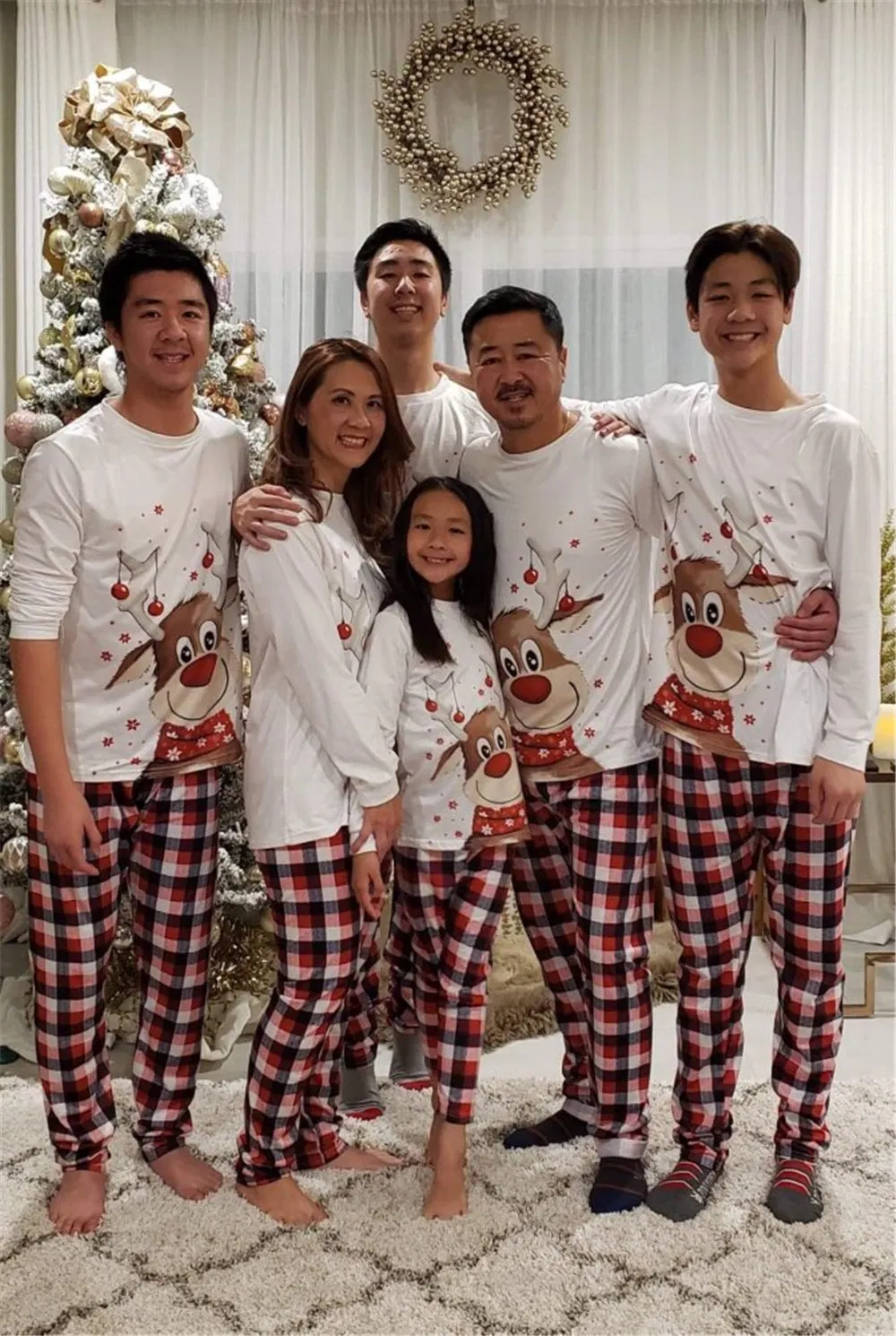 Conjunto de pijamas de manga larga para toda la familia con estampado navideño