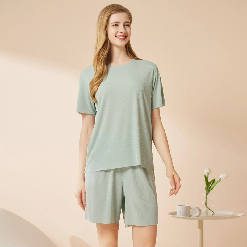 Pijamas de pareja de modal suave al por mayor 2PCS camiseta de manga corta + pantalones cortos elásticos de ajuste holgado, traje de noche transpirable para hombres y mujeres, ropa de casa diaria para dormir y descansar