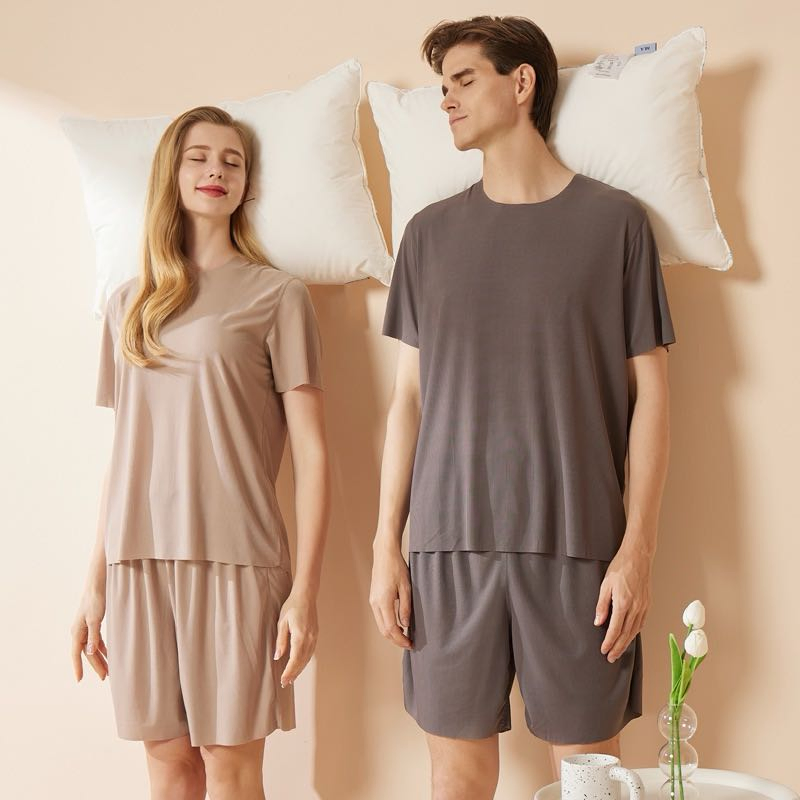 Pijamas de pareja de modal suave al por mayor 2PCS camiseta de manga corta + pantalones cortos elásticos de ajuste holgado, traje de noche transpirable para hombres y mujeres, ropa de casa diaria para dormir y descansar