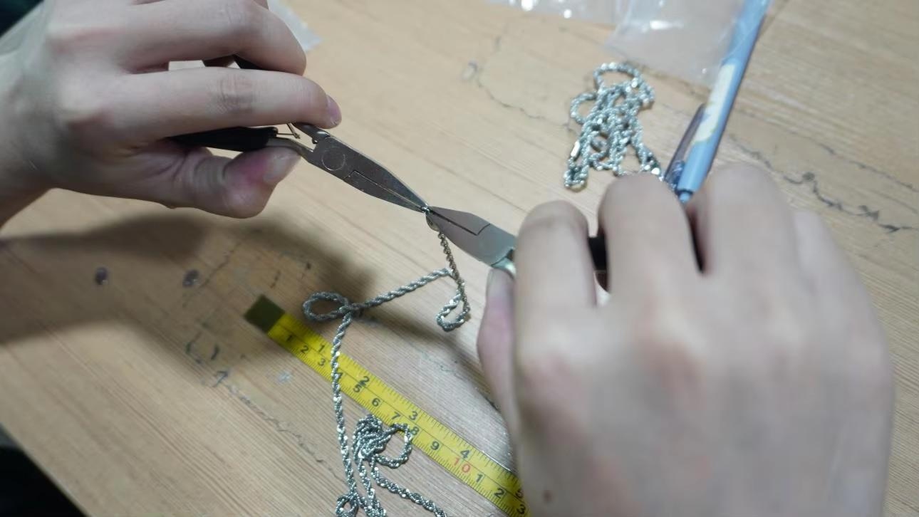 Final assembly line for stainless steel jewelry products at Cannhost Shenzhen factory
