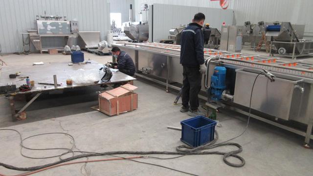 CarniTe Machinery factory production floor showing advanced food processing equipment