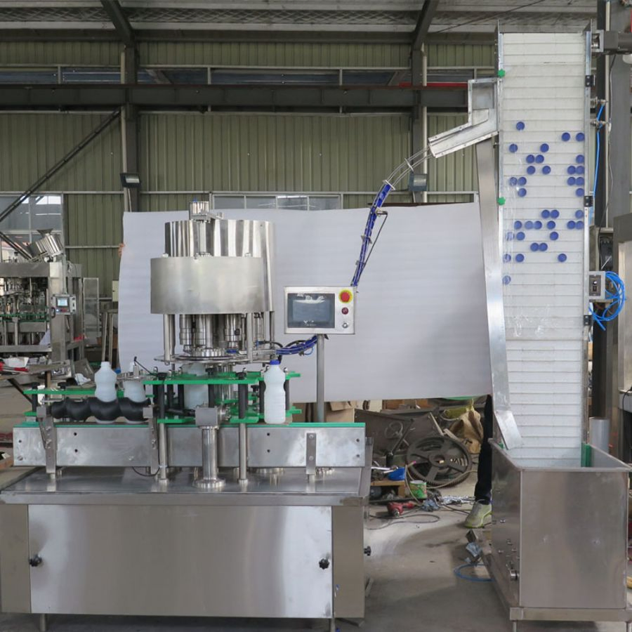 Automatic Plastic Bottle Filling, Capping, and Labeling System