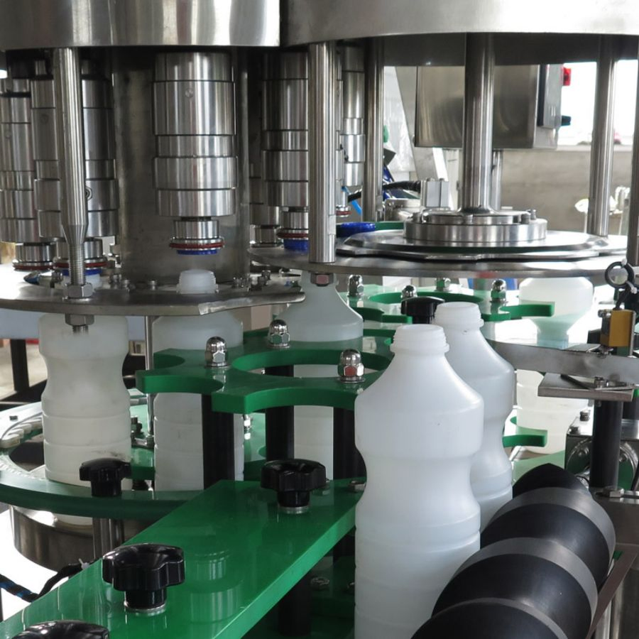 Automatic Plastic Bottle Filling, Capping, and Labeling System