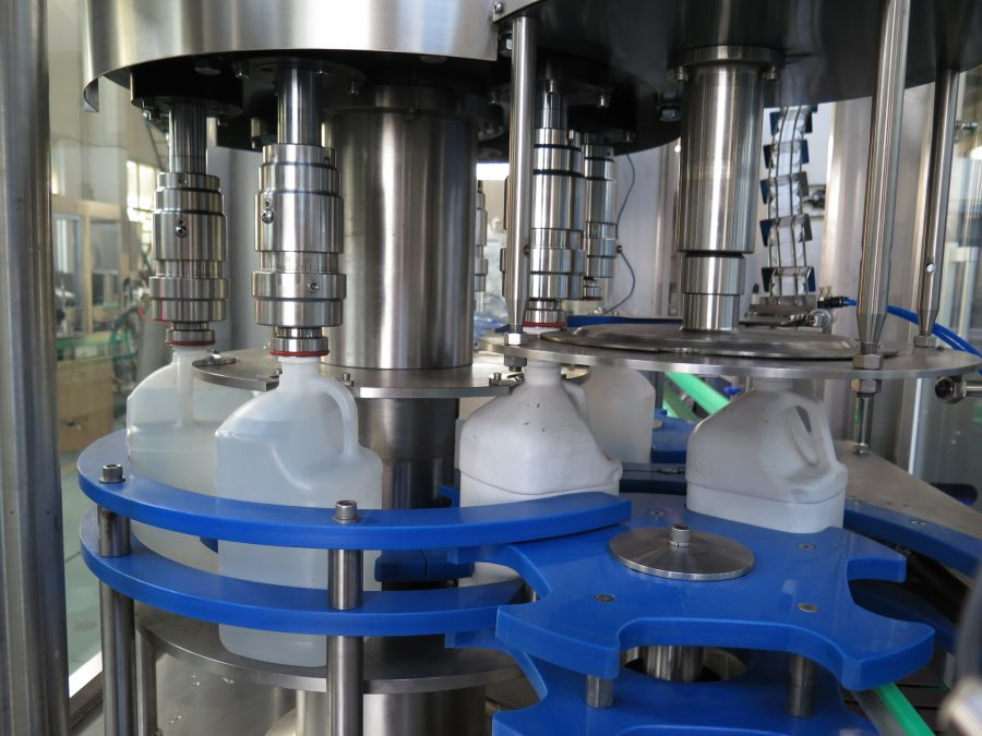 Automatic Plastic Bottle Filling, Capping, and Labeling System