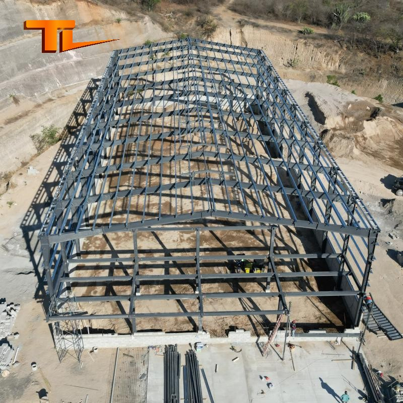 Edificios de almacenamiento de vigas H, instalaciones de almacenes prefabricados con estructura duradera para la construcción de talleres y naves industriales