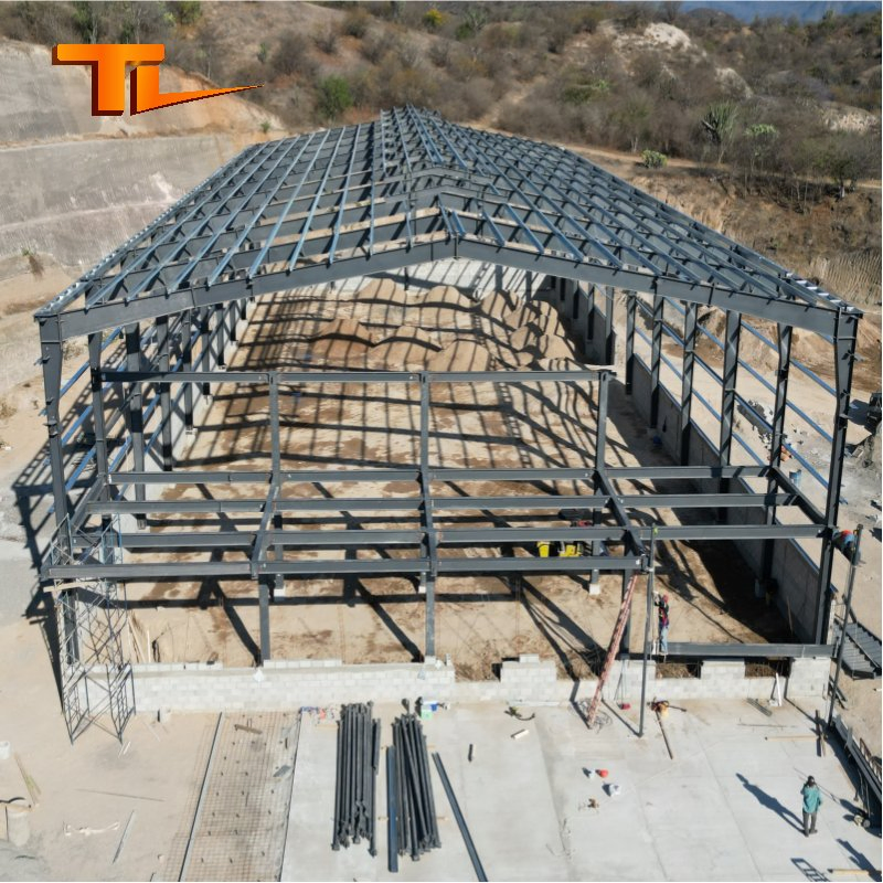 Edificios de almacenamiento de vigas H, instalaciones de almacenes prefabricados con estructura duradera para la construcción de talleres y naves industriales