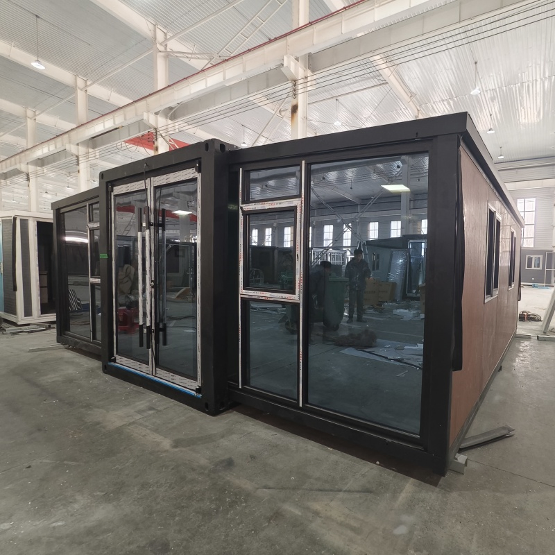 ¿Qué es una casa contenedor expandible fácilmente movible con resistencia al viento, casa modular prefabricada móvil 20 casa de vidrio móvil blanca personalizada?