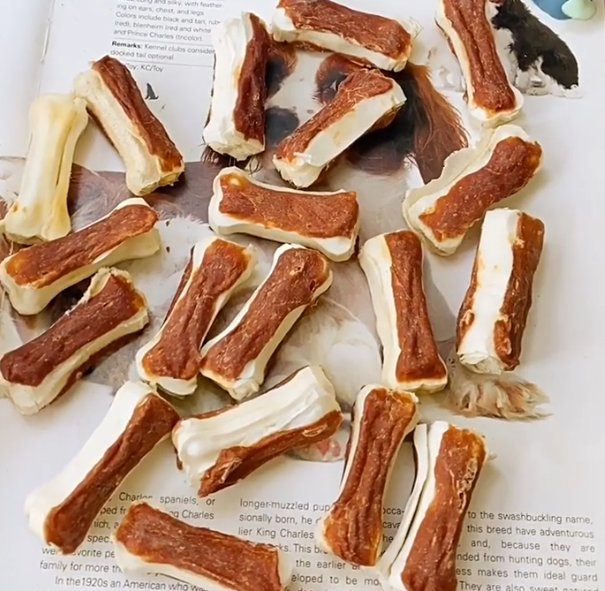 Alimento para mascotas al por mayor premium, huesos prensados con sabor a pato deshidratado, seguros para perros