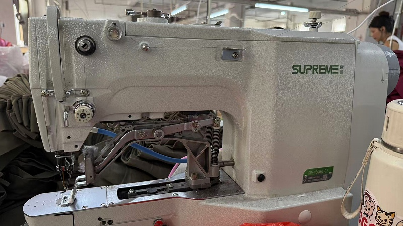 Bartack machine for reinforced seam strength at CGE Clothing factory