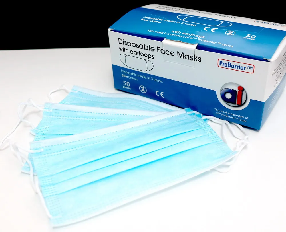 Mascarilla desechable cómoda azul con orejeras paquete a granel uso diario 3ply