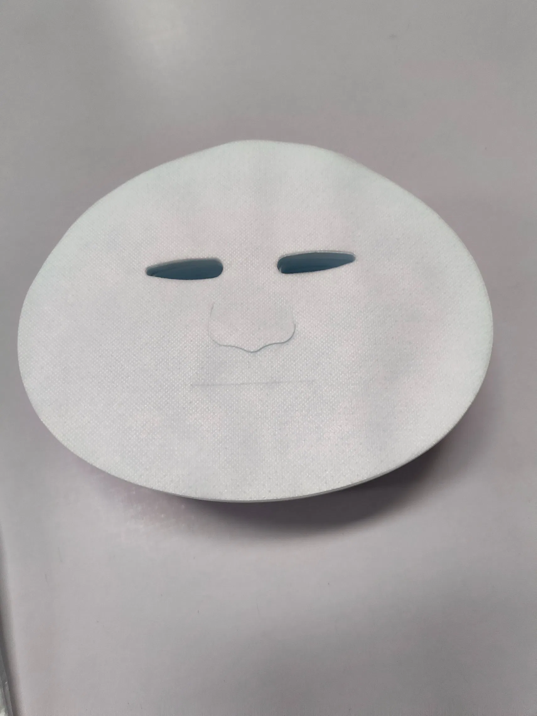 Tela no tejida OEM Tencel Lyocell natural orgánica máscara facial seca 2 capas precortadas máscaras faciales