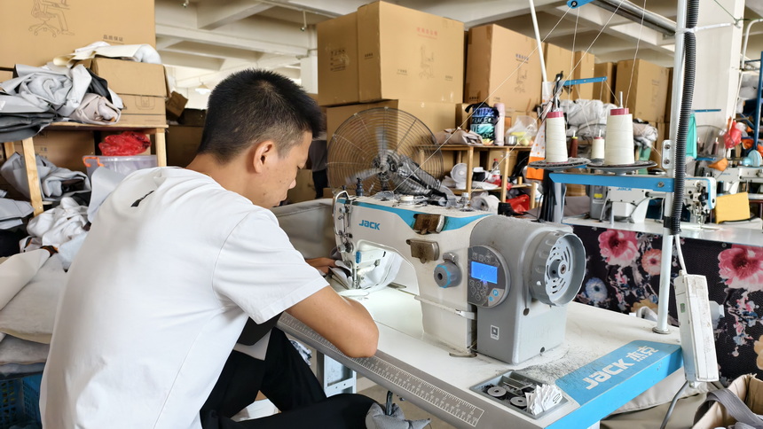 Industrial sewing machine for office chair upholstery production