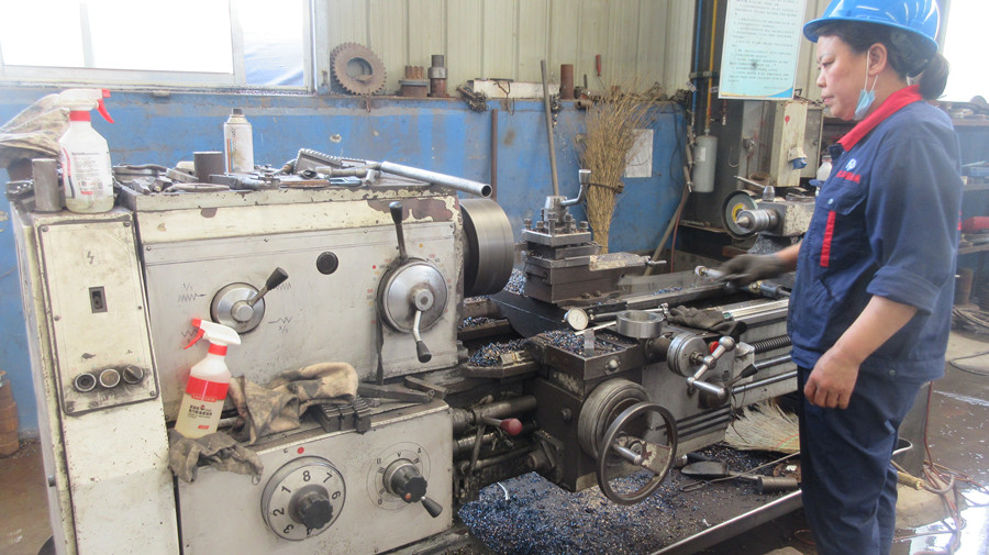 CNC machining process at Changi Logistics facility