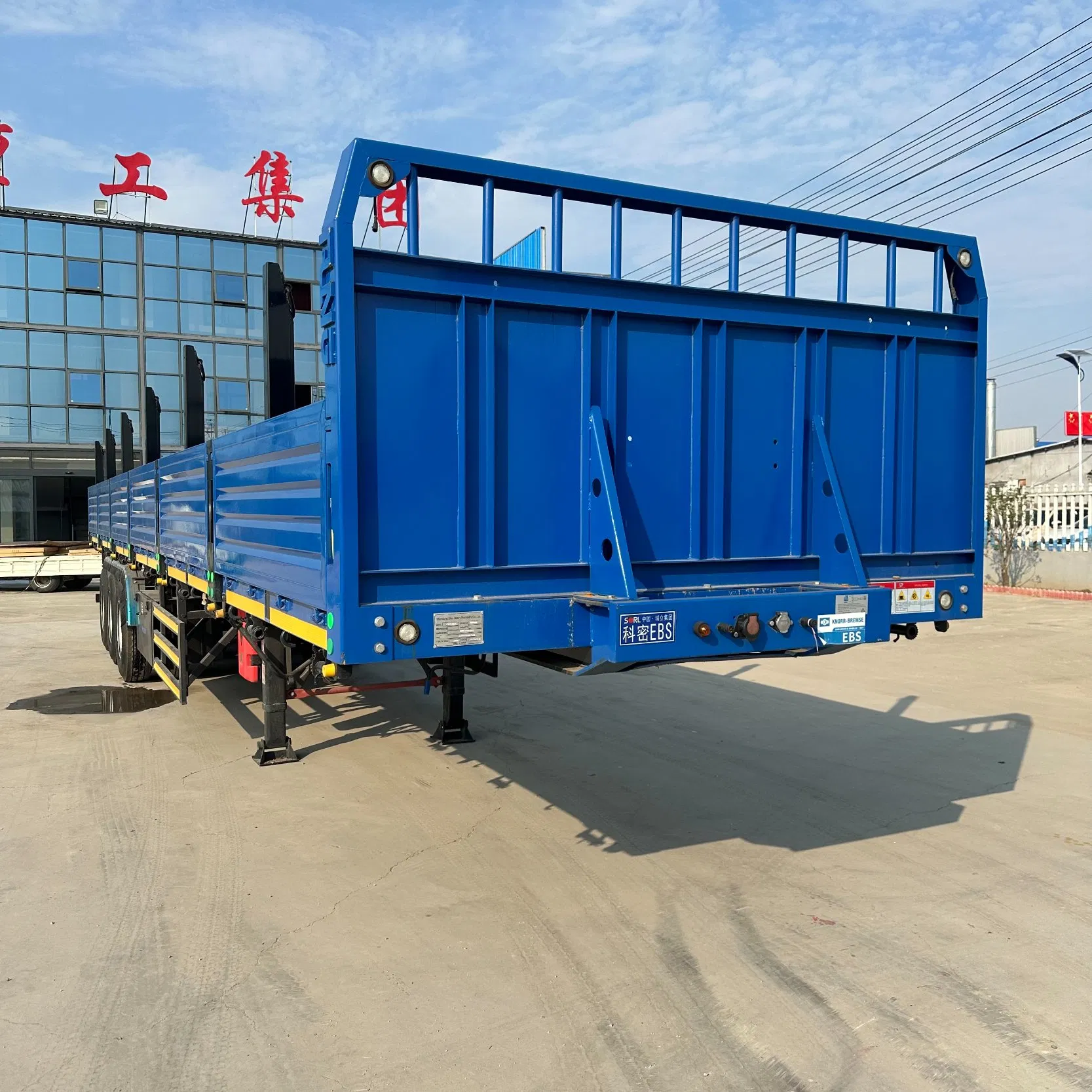 Versatile Flatbed Trailer with Detachable Panels for Container and Timber Transport
