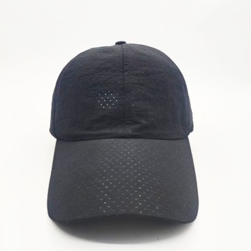 Sports caps with breathable perforated panels